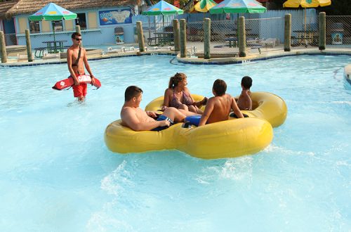 Families on waterpark rides